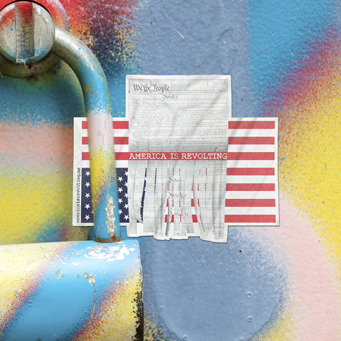 Graffiti with an upside down flag sticker with America is Revolting text on a colorful background